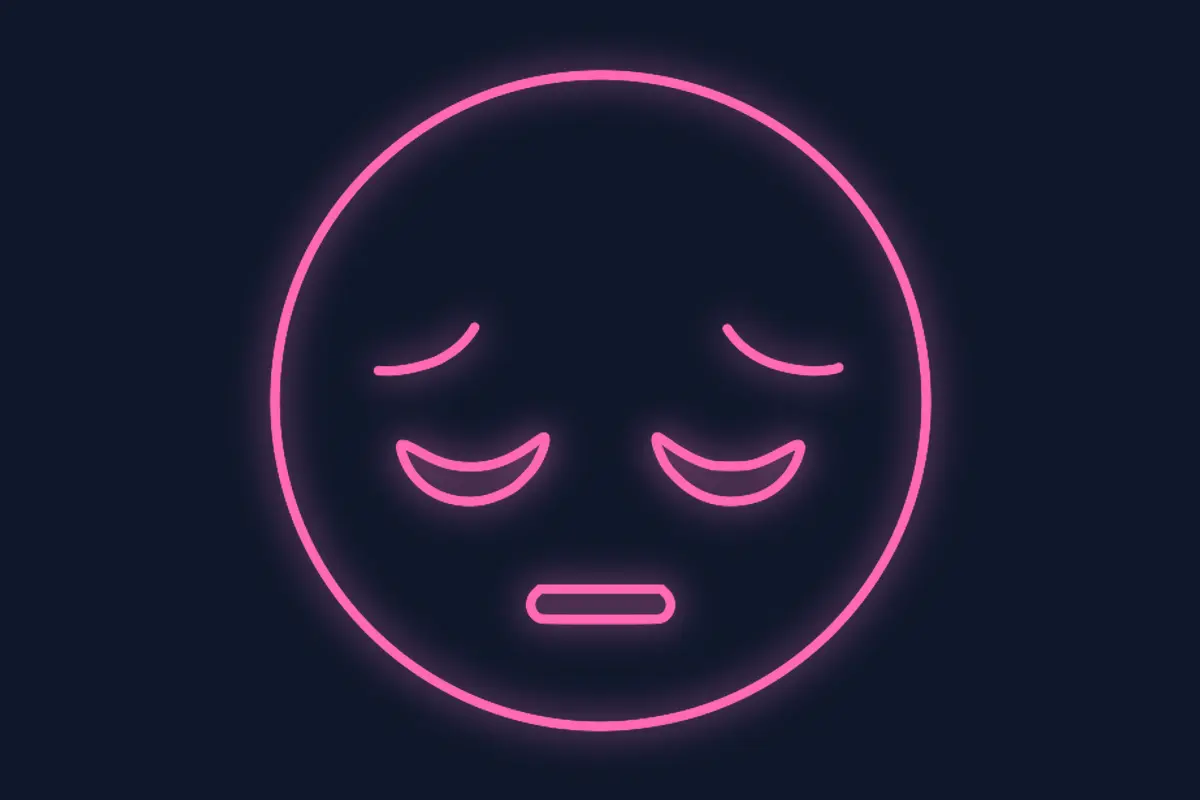 Emoji con cara triste al borde de llorar