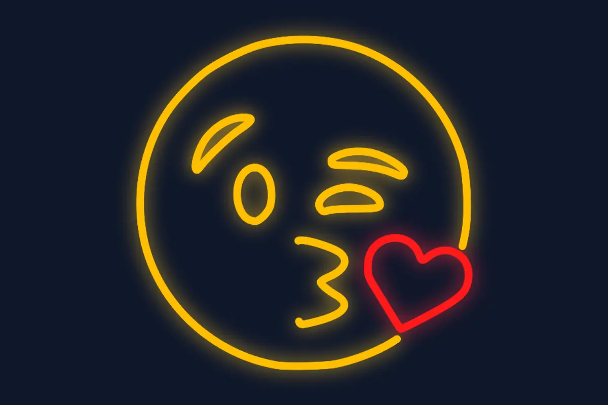 Emoticono mandando beso