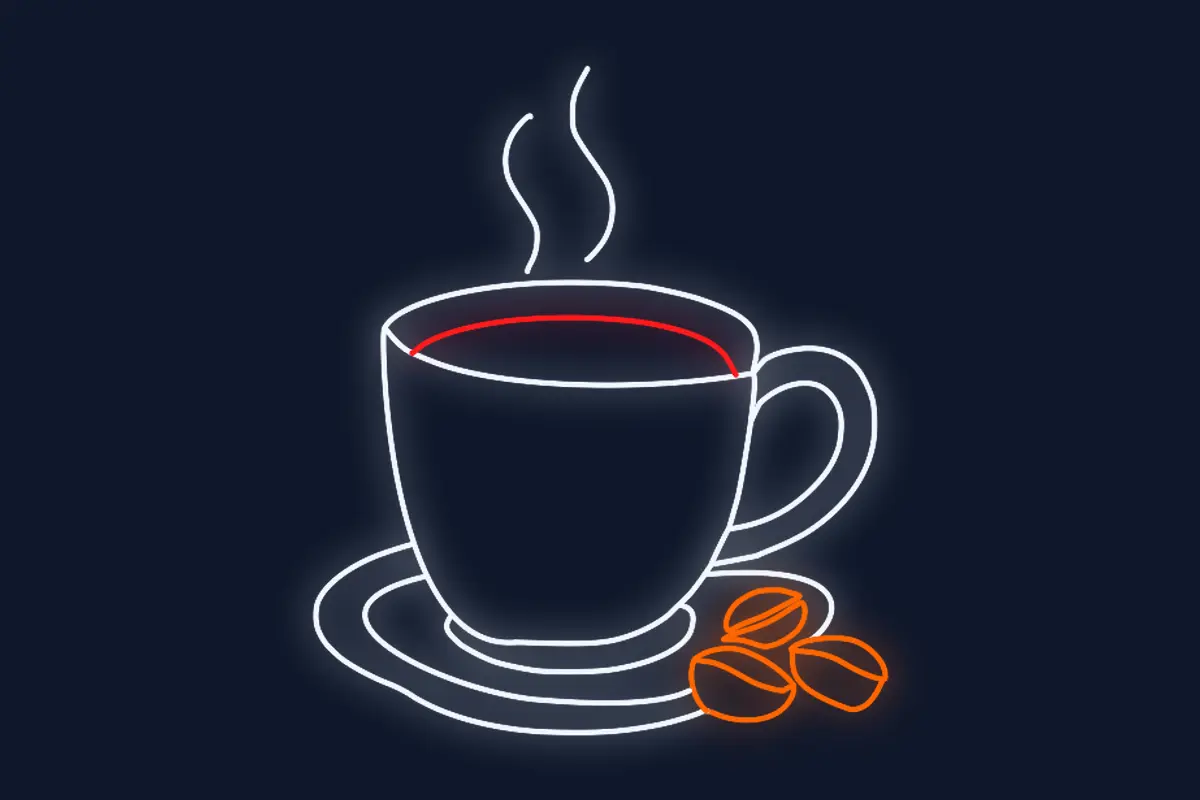 Vaso de cafe caliente con platito y 3 granitos